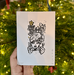 Image of an original lino cut christmas card by Megu Ueda